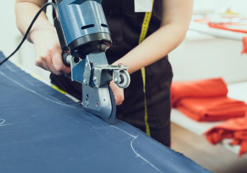 Cutting textile on a sewing manufacture